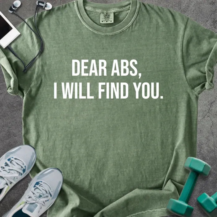 Moss t-shirt printed with "Dear Abs, I Will Find You." in white