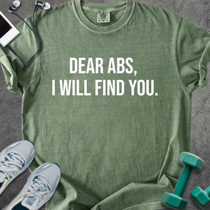 Moss t-shirt printed with "Dear Abs, I Will Find You." in white