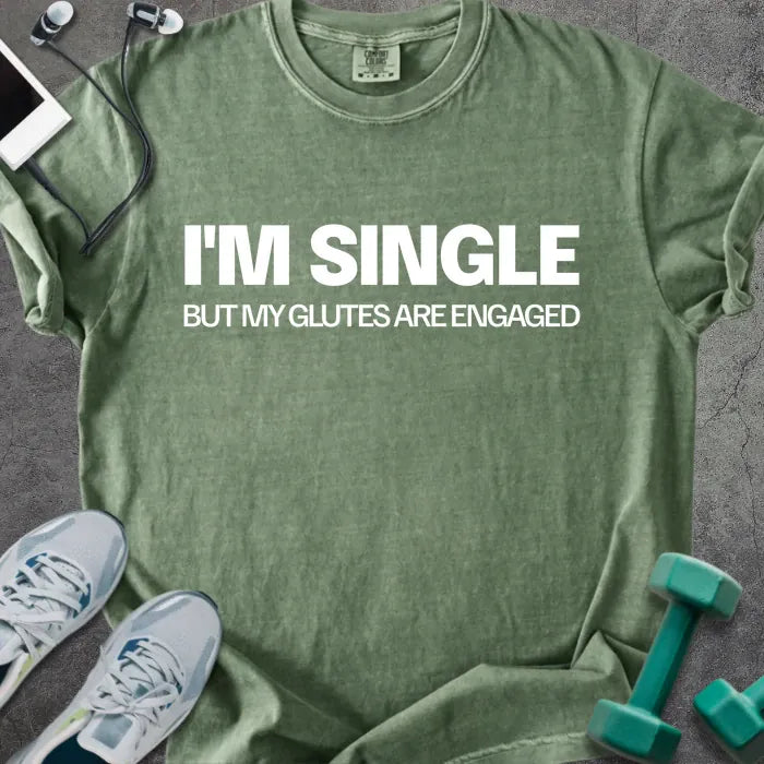 Moss t-shirt printed with "I'm Single but my Glutes Are Engaged" in white