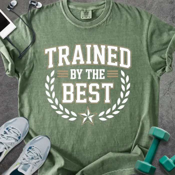 Moss t-shirt printed with "Trained By the Best" in tan and white, with laurel wreath and star