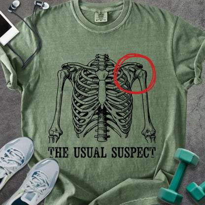 Moss t-shirt printed with "The Usual Suspect", with skeleton ribcage and red circled heart