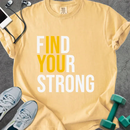 Mustard t-shirt printed with "Find Your Strong" in white and gold