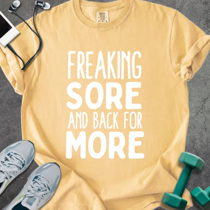 Mustard t-shirt printed with "Freaking Sore and Back for More" in white