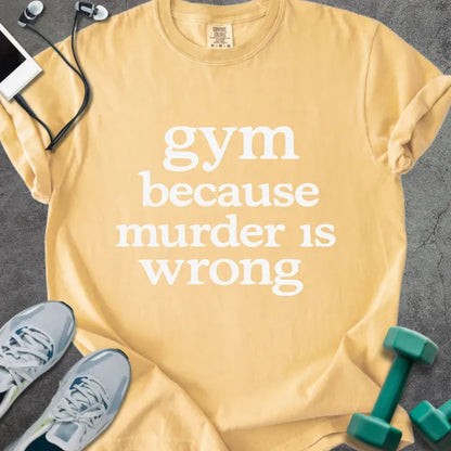 Mustard t-shirt printed with "gym because murder is wrong" in white