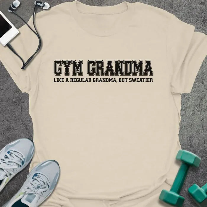 Natural t-shirt printed with "GYM GRANDMA, LIKE A REGULAR GRANDMA, BUT SWEATIER" in black