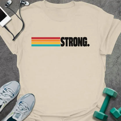 Natural t-shirt printed with "STRONG." in black, with retro red, orange, yellow and teal stripes