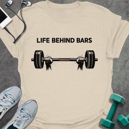 Cream t-shirt printed with "Life Behind Bars", with a barbell