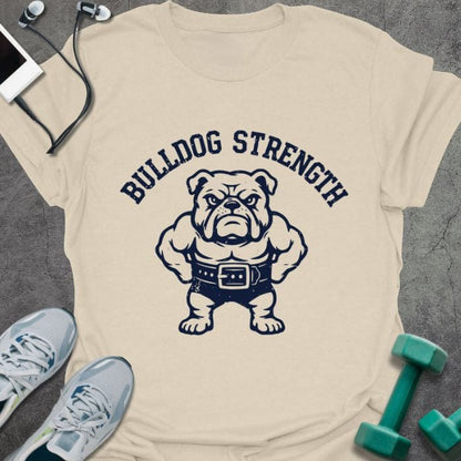 Cream t-shirt printed with "Bulldog Strength", with a muscular bulldog wearing a lifting belt