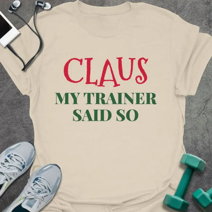 Natural t-shirt printed with "CLAUS MY TRAINER SAID SO" in red and green