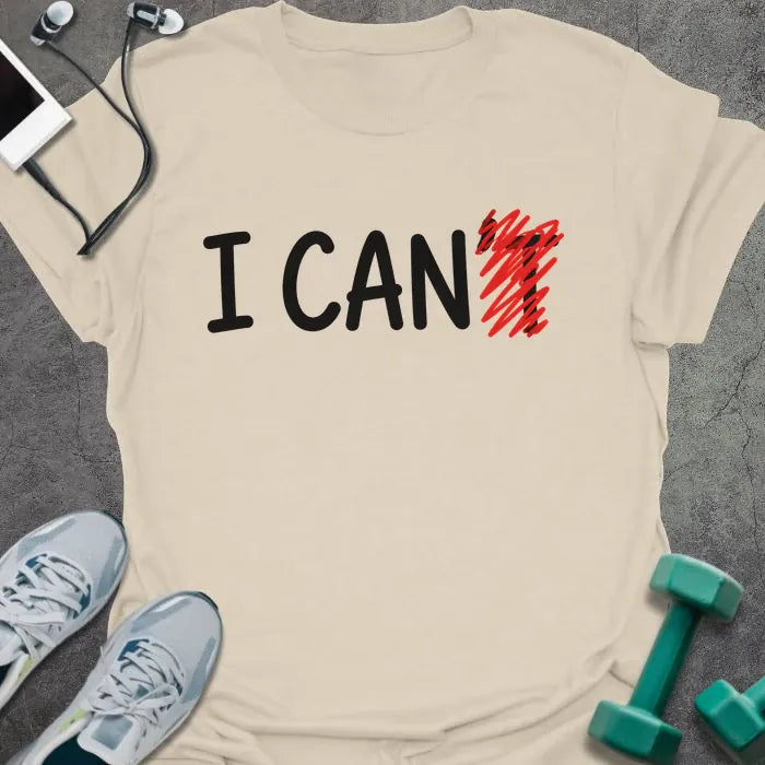 Natural t-shirt printed with "I CAN't" in black and red, with t crossed out