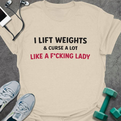 Cream t-shirt printed with "I Lift Weights & Curse a Lot Like a F Cking Lady" in red