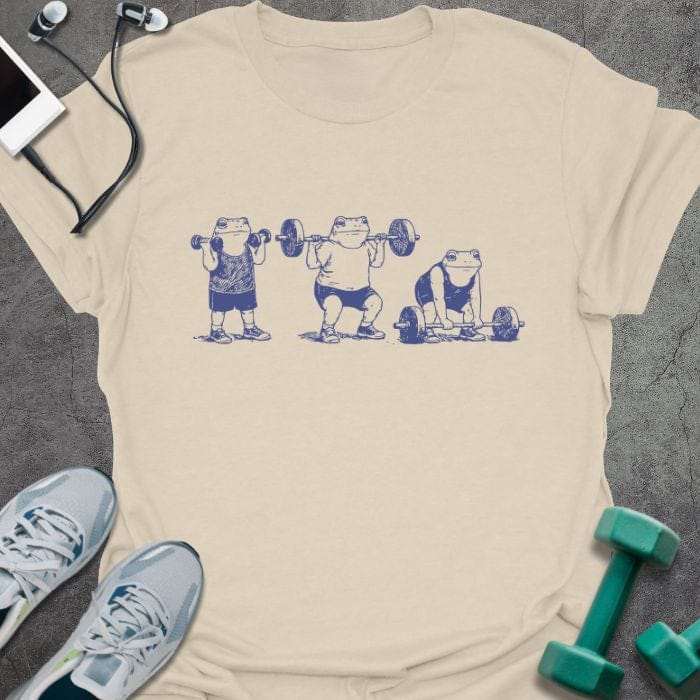 Cream t-shirt with an illustration of three people lifting dumbbells in blue