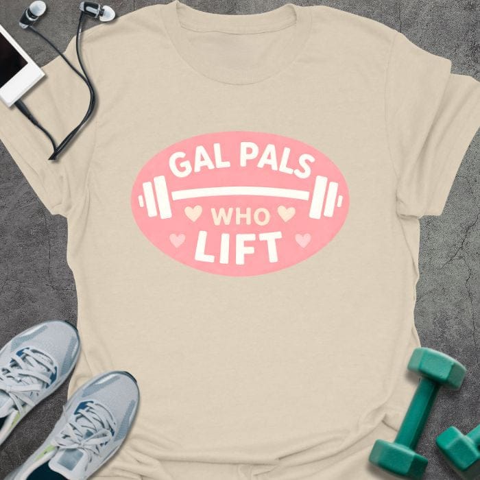 Cream t-shirt printed with "Gal Pals Who Lift" in white, pink, with a barbell