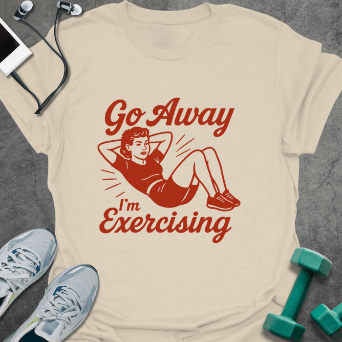 Cream t-shirt printed with "Go Away I'm Exercising" in red and brown, with an illustration of a woman doing a sit-up