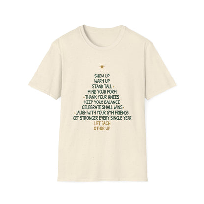 Natural t-shirt printed with a Christmas tree made of words, "SHOW UP, WARM UP, STAND TALL, MIND YOUR FORM, THANK YOUR KNEES, KEEP YOUR BALANCE, CELEBRATE SMALL WINS, LAUGH WITH YOUR GYM FRIENDS, GET STRONGER EVERY SINGLE YEAR, LIFT EACH OTHER UP", in green and gold with a gold star on top