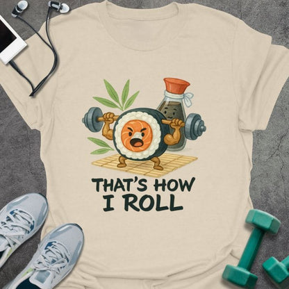 Cream t-shirt printed with "That's How I Roll", with an illustration of sushi and sauce lifting weights