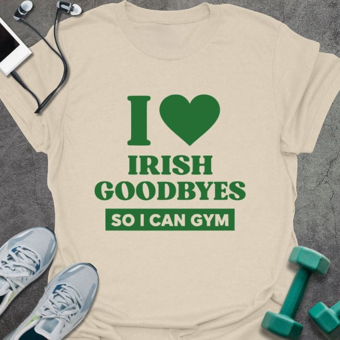 Cream t-shirt printed with "I Heart Irish Goodbyes so I Can Gym" in green, with clover