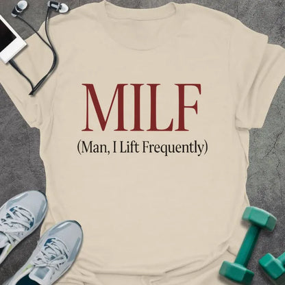 Cream t-shirt printed with "MILF (Man, I Lift Frequently)" in red