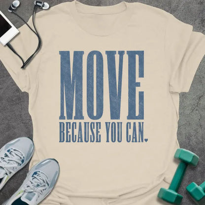 Natural t-shirt printed with "MOVE BECAUSE YOU CAN." in steel blue bold caps
