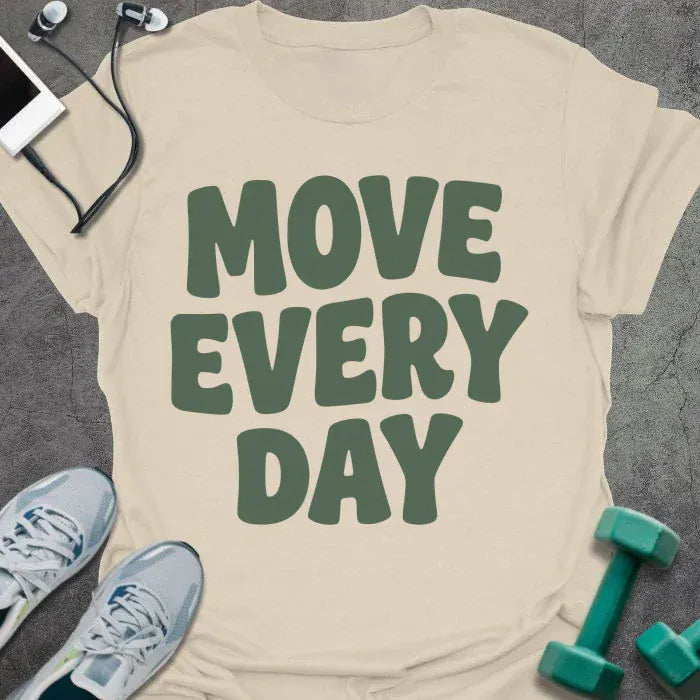 Cream t-shirt printed with "Move Every Day" in green