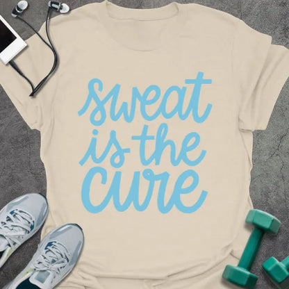 Cream t-shirt printed with "sweat is the cure" in blue