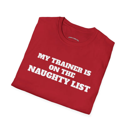 Folded cherry red t-shirt printed with "MY TRAINER IS ON THE NAUGHTY LIST" in white