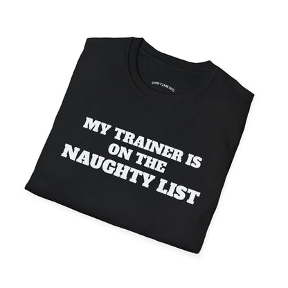 Folded black t-shirt printed with "MY TRAINER IS ON THE NAUGHTY LIST" in white