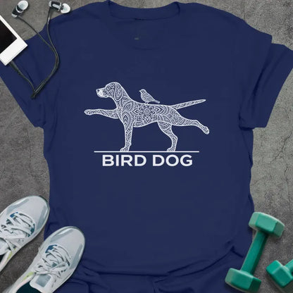 Navy t-shirt printed with "BIRD DOG" in white, with a patterned dog in the bird dog exercise pose and a small bird on its back