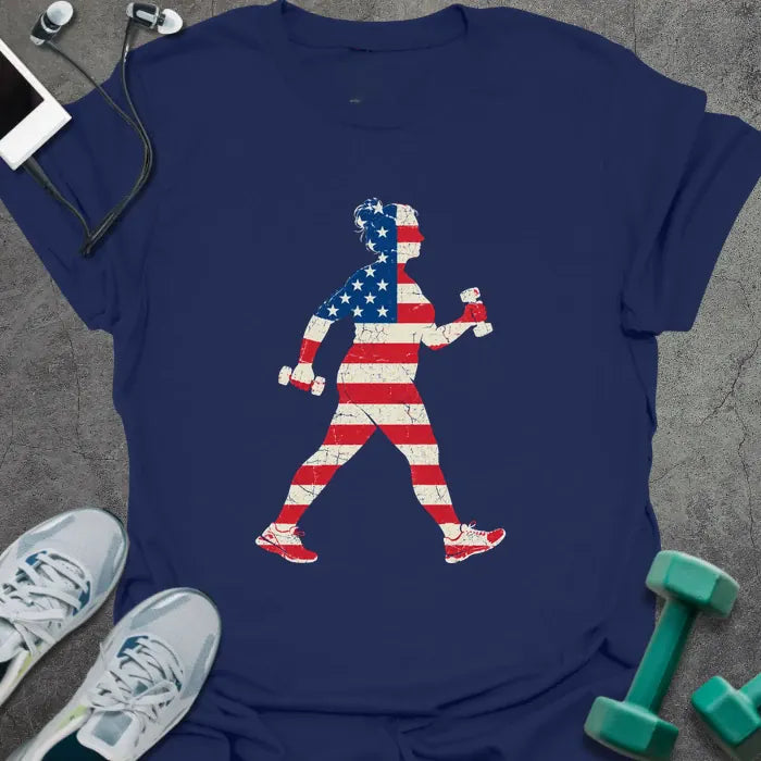 Navy t-shirt printed with a woman power walking with hand weights, filled with a distressed American flag