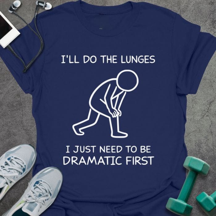 Navy t-shirt printed with "I'll Do the Lunges I Just Need to Be Dramatic First", with stick figure illustration
