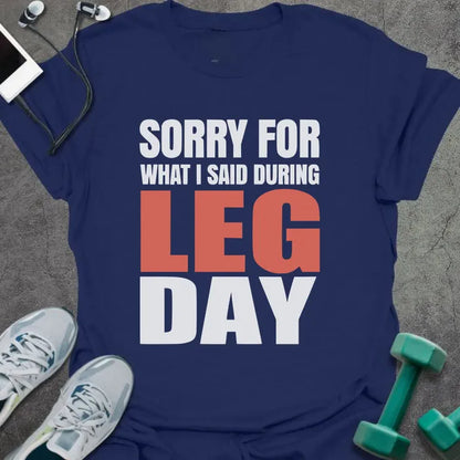 Navy t-shirt printed with "Sorry for What I Said During Leg Day" in white and red