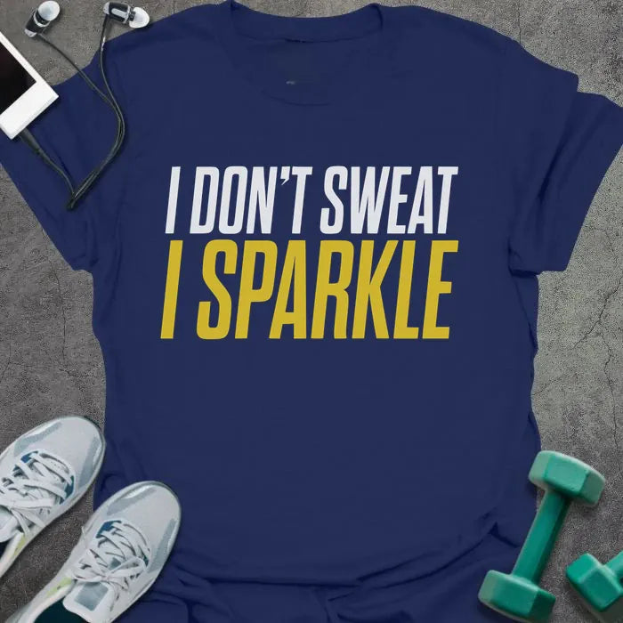 Navy t-shirt printed with "I Don't Sweat I Sparkle" in white and yellow