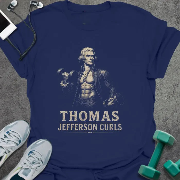 Navy t-shirt printed with "Thomas Jefferson Curls", with an illustration of Thomas Jefferson with an exposed muscular torso doing dumbbell curls