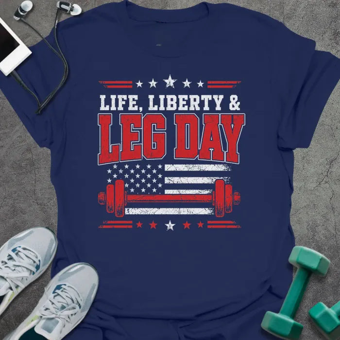 Navy t-shirt printed with "Life. Liberty & Legday" in white and red, with stars, a stars-and-stripes flag, and a barbell