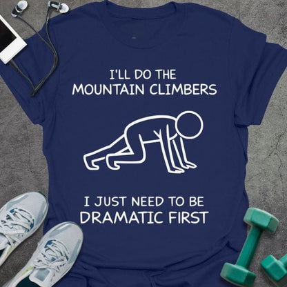 Navy t-shirt printed with "I'll Do the Mountain Climbers I Just Need to Be Dramatic First", with stick figure illustration