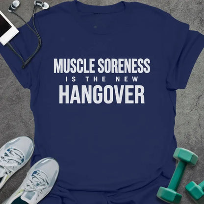 Navy t-shirt printed with "Muscle Soreness is the New Hangover" in white