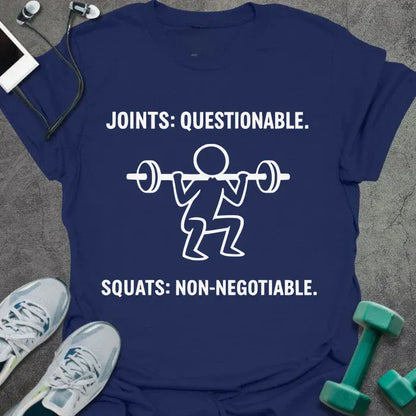 Navy t-shirt printed with "Joints: Questionable. Squats: Non-negotiable." in white, with a white line art stick figure squatting with barbell