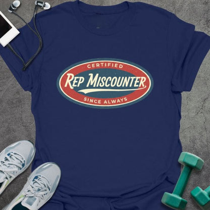 Navy t-shirt printed with "CERTIFIED Rep Miscounter SINCE ALWAYS" in red and blue