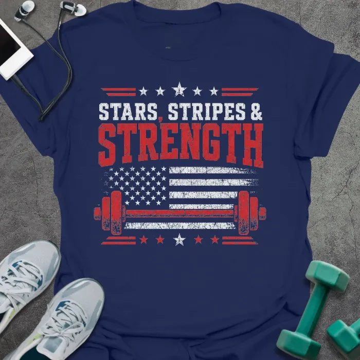 Navy t-shirt printed with "Stars Stripes & Strength" in white, red, and blue, with a distressed flag and barbell graphics