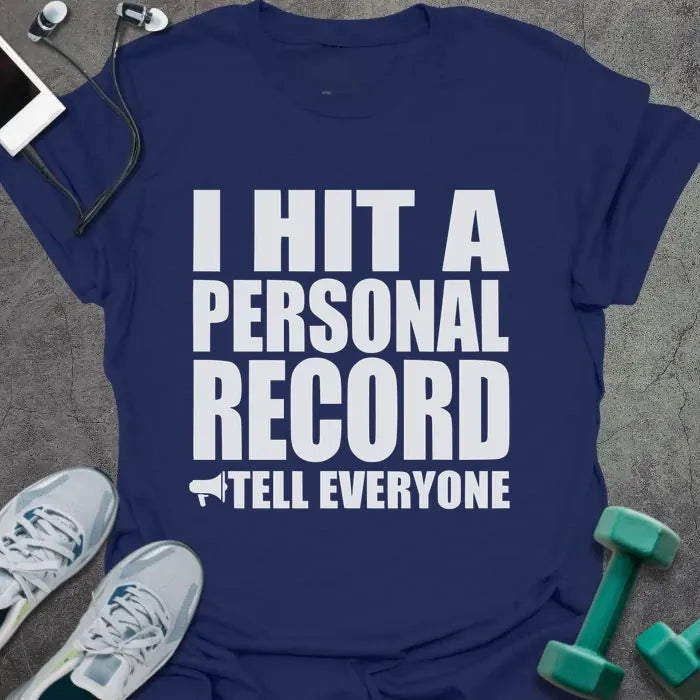 Navy t-shirt printed with "I Hit a Personal Record Tell Everyone" in white, with megaphone graphic
