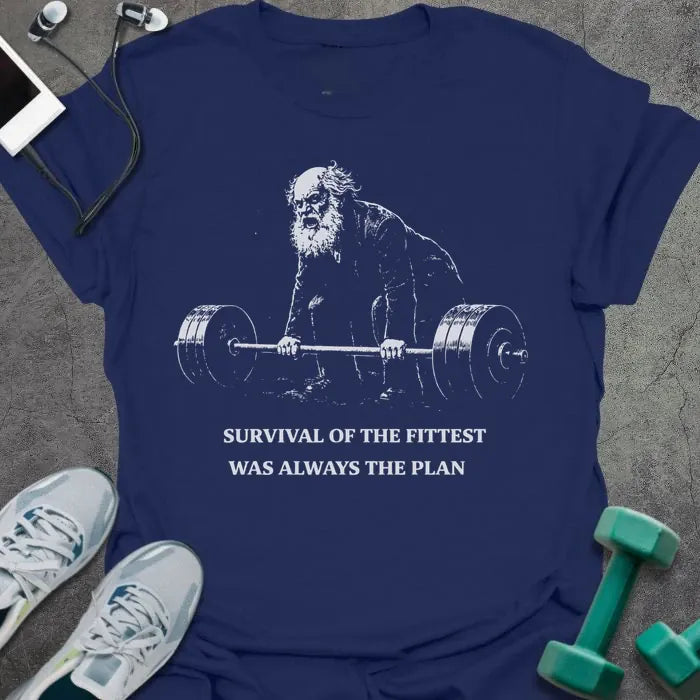 Navy t-shirt printed with "Survival of the Fittest Was Always the Plan" in white, with bearded figure lifting barbell graphic