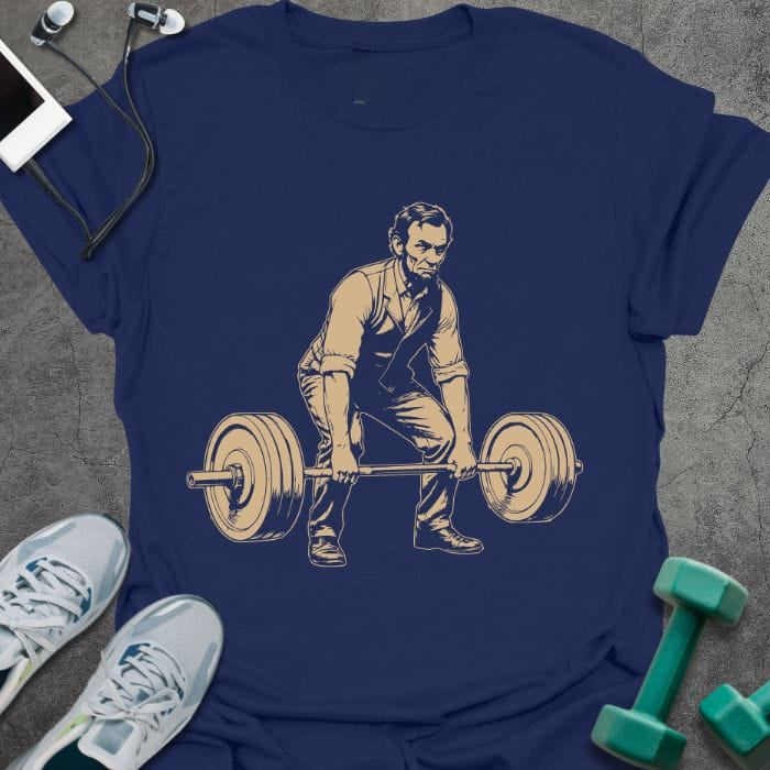 Navy t-shirt with Abraham Lincoln doing deadlift graphic in tan and black