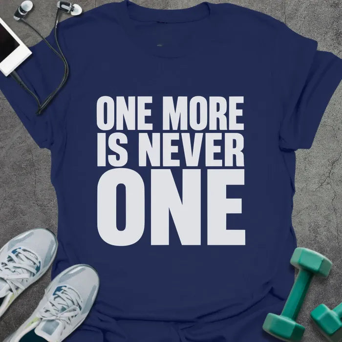 Navy t-shirt printed with "One More is Never One" in white