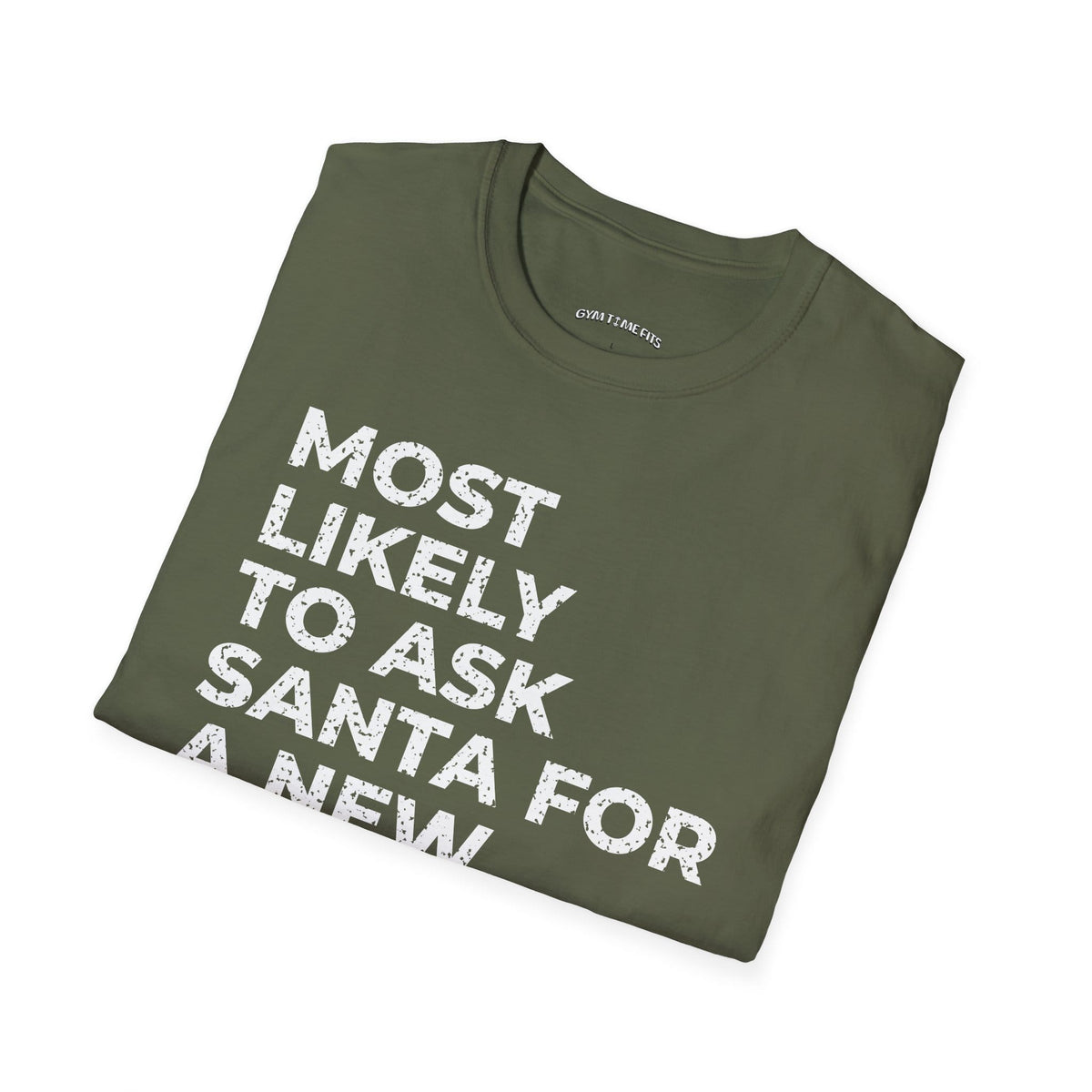 Folded military green t-shirt printed with "MOST LIKELY TO ASK SANTA FOR A NEW TRAINER" in white