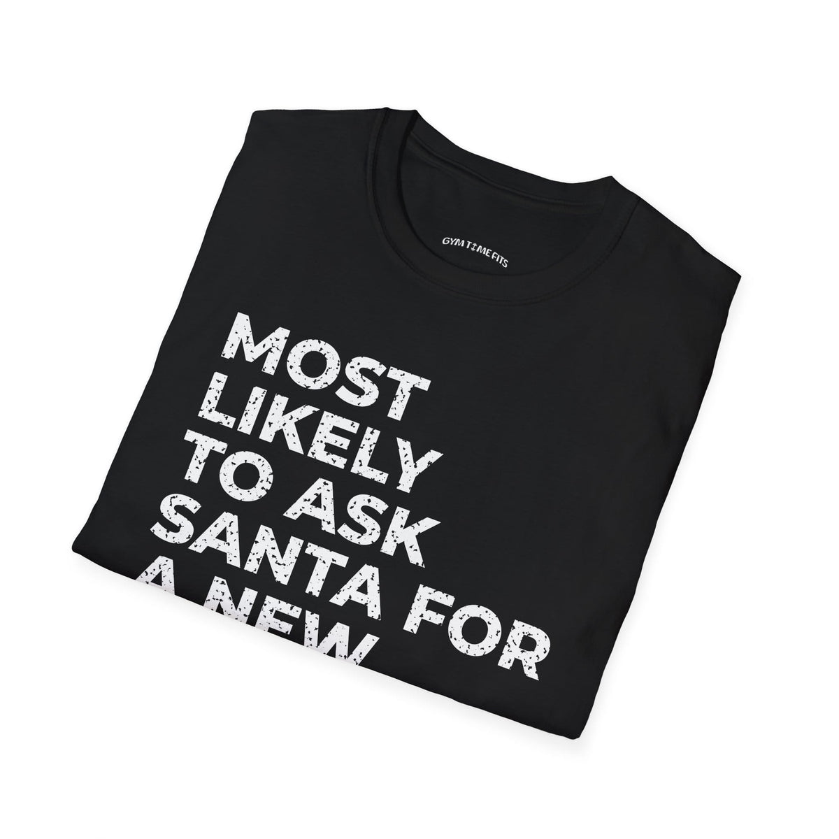 Folded black t-shirt printed with "MOST LIKELY TO ASK SANTA FOR A NEW TRAINER" in white