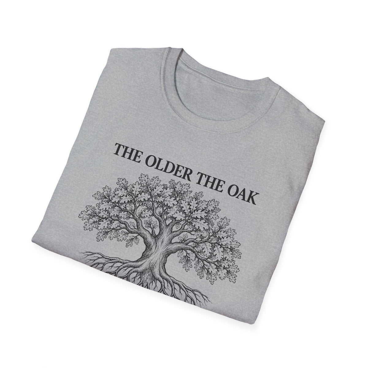 Folded sport grey t-shirt printed with "THE OLDER THE OAK, THE STRONGER IT STANDS" in black, with a drawing of an oak tree and its roots