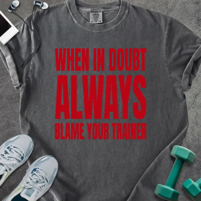 Pepper t-shirt printed with "When in Doubt Always Blame Your Trainer" in red