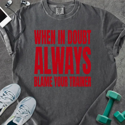 Pepper t-shirt printed with "When in Doubt Always Blame Your Trainer" in red