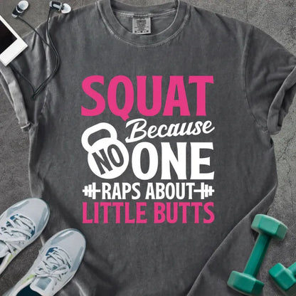 Pepper t-shirt printed with "SQUAT Because NOBODY RAPS ABOUT LITTLE BUTTS" in pink and white