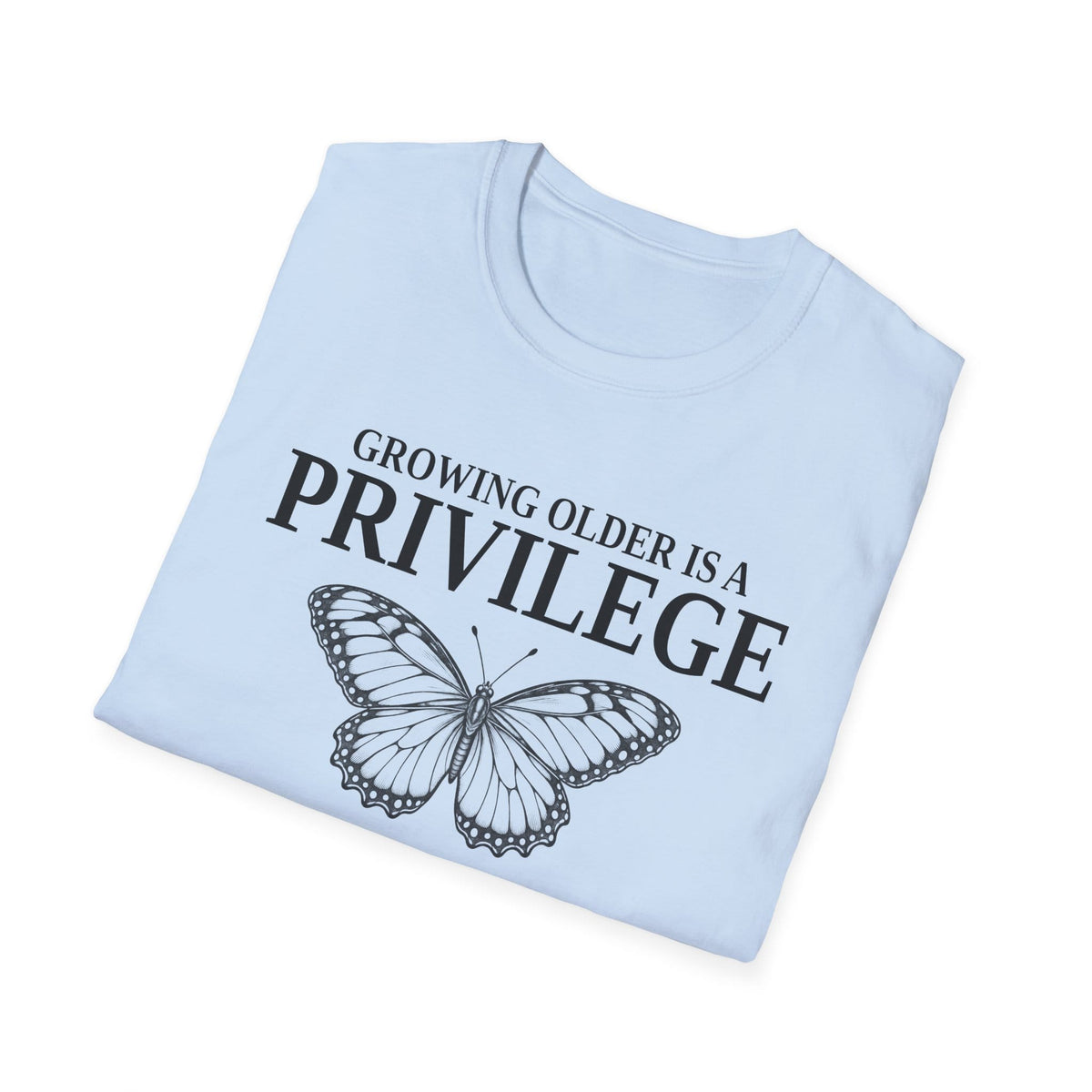 Folded light blue t-shirt printed with "GROWING OLDER IS A PRIVILEGE, GROWING STRONGER IS A CHOICE" in black, with a line-drawn butterfly